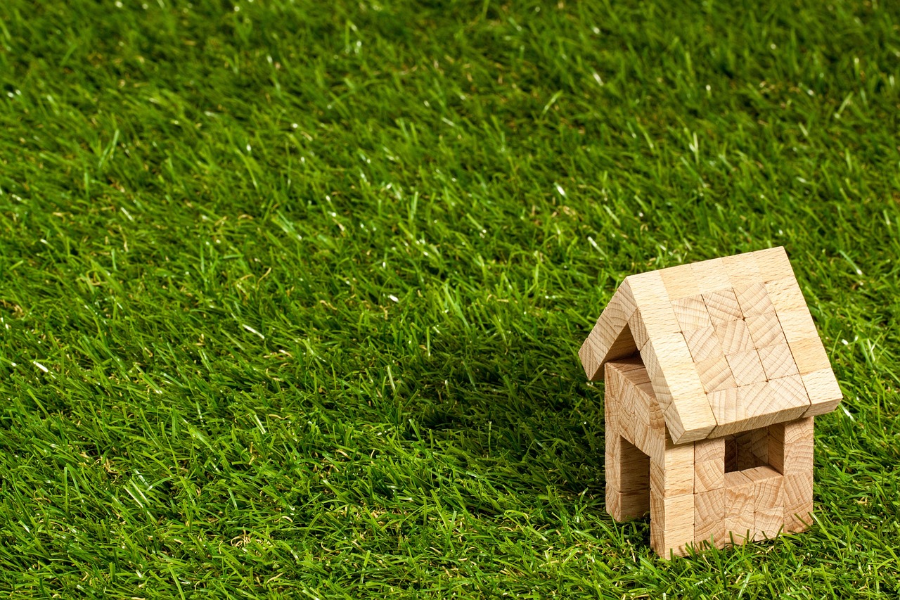 image of a small building in grass